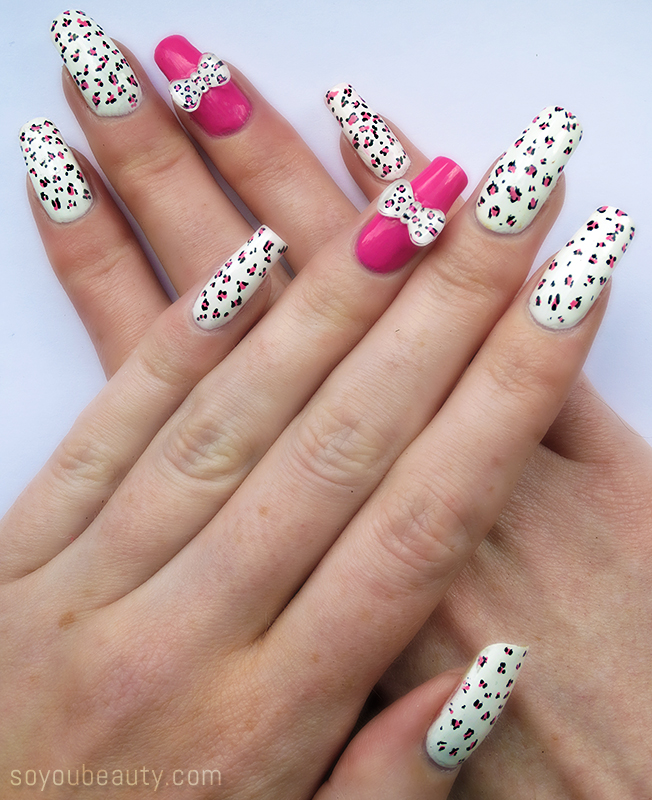 white and pink leopard nails