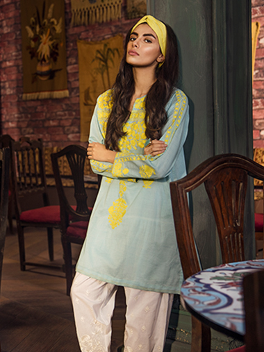 Girl in Blue and Yellow Mix Khaadi Kurta with white Bottom