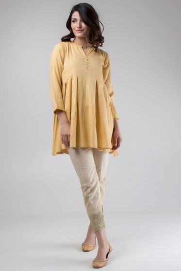 Pretty girl in Yellow Pret and Skin Tights by Khaadi New Summer Collection 2018